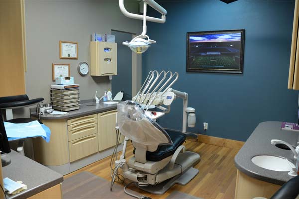 Town Square Dental Care exam room with patient chair and dental instruments